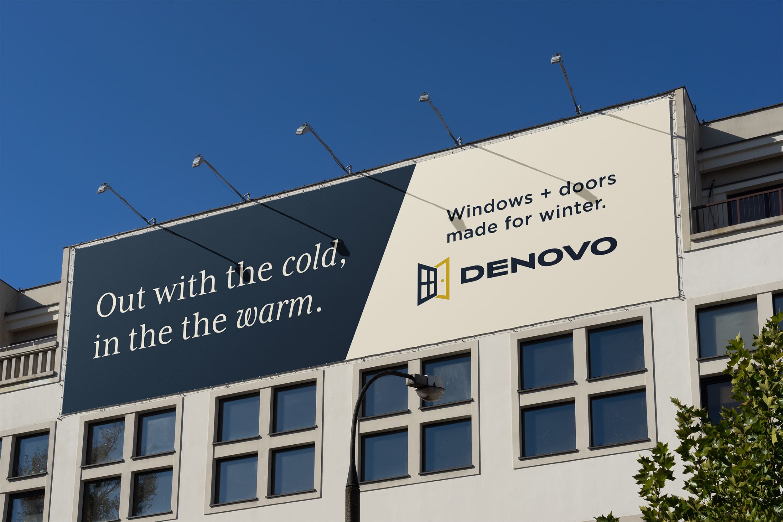 Billboard on a building with Denovo branding